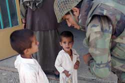 American soldier with Afghani children
